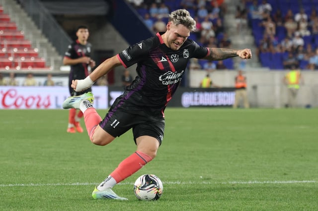 Jul 29, 2025; Harrison, New Jersey, USA; Puebla forward Emiliano Gomez (11) kicks the ball during the second half against New York City FC at Sports Illustrated Stadium. Mandatory Credit: Vincent Carchietta-Imagn Images