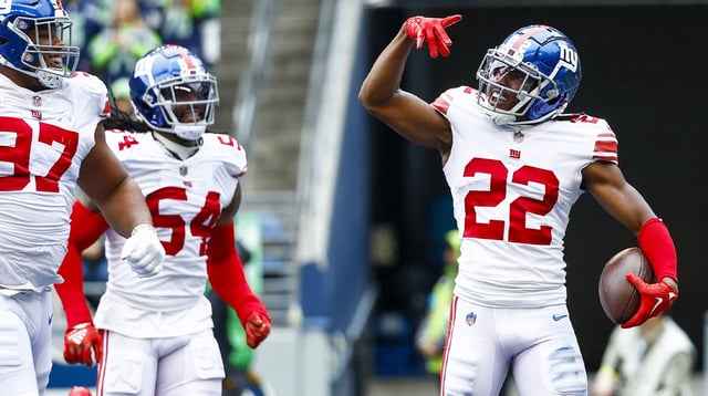 Oct 30, 2022; Seattle, Washington, USA; New York Giants cornerback Adoree Jackson (22) celebrates following a fumble recovery against the Seattle Seahawks during the second quarter at Lumen Field. New York Giants defensive tackle Dexter Lawrence (97) joins Jackson at left. Mandatory Credit: Joe Nicholson-Imagn Images