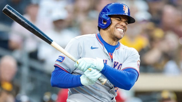 Jul 29, 2025; San Diego, California, USA; New York Mets right fielder Juan Soto (22) reacts after fouling off a ball off his lower extremity during the fourth inning against the New York Mets at Petco Park. Mandatory Credit: David Frerker-Imagn Images