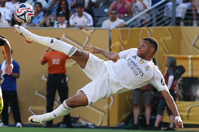 Jul 5, 2025; East Rutherford, New Jersey, USA; Real Madrid CF forward Kylian Mbappe (9) scores a goal against Borussia Dortmund in the second half during a quarterfinal match of the 2025 FIFA Club World Cup at MetLife Stadium. Mandatory Credit: Vincent Carchietta-Imagn Images/File Photo