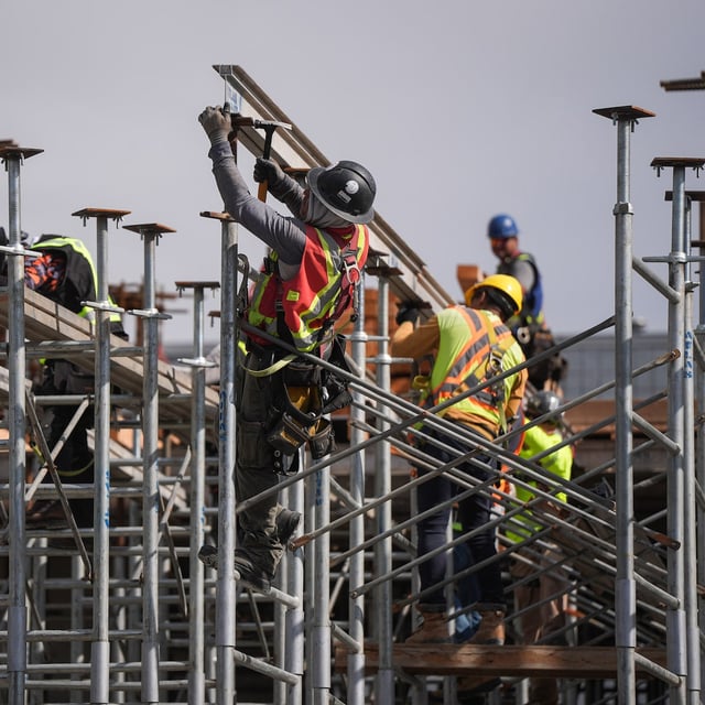 Workers at the construction site for a condo tower in Delta, B.C., on July 2. B.C. housing industry players said in a letter to Prime Minister Mark Carney that if nothing changes, housing supply could continue its slowdown.