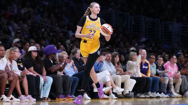 Jul 29, 2025; Los Angeles, California, USA; LA Sparks forward Cameron Brink (22) dribbles the ball against the Las Vegas Aces in the first half at Crypto.com Arena. Mandatory Credit: Kirby Lee-Imagn Images