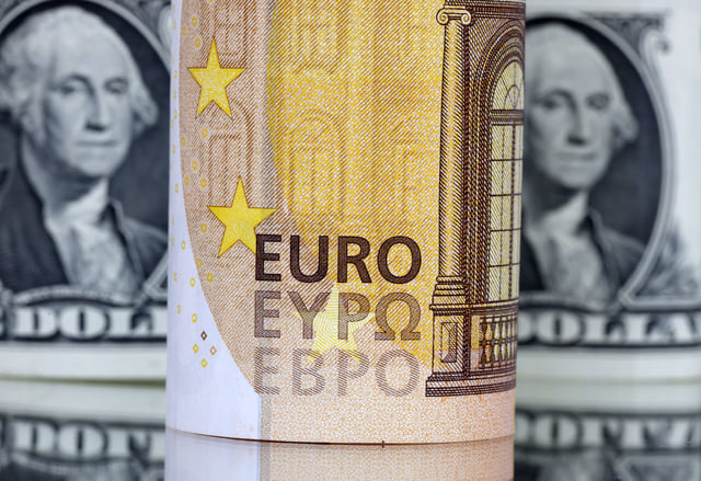 U.S. Dollar and Euro banknotes are seen in this illustration taken July 17, 2022. REUTERS/Dado Ruvic/Illustration/File Photo