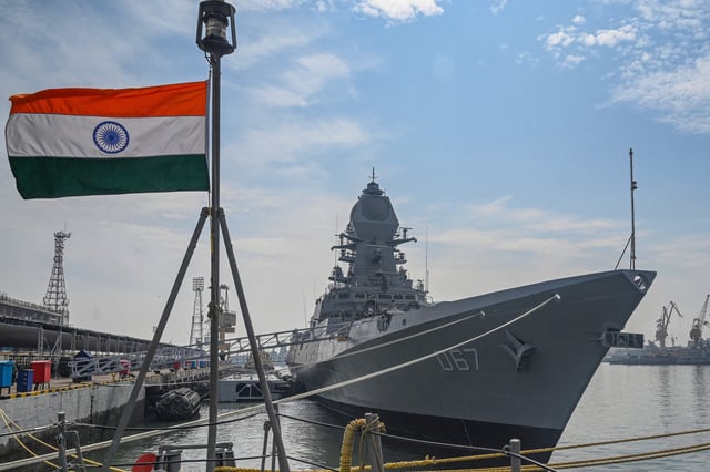 In this photograph taken on December 15, 2022, the guided missile destroyer Mormugao is seen docked at the Naval Dockyard in Mumbai on the eve of its commissioning into the Indian Navy.