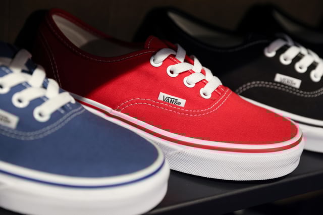 Shoes are seen for sale at a Vans store, a brand owned by VF Corporation, in Manhattan, New York City, U.S., May 20, 2022. REUTERS/Andrew Kelly/File photo