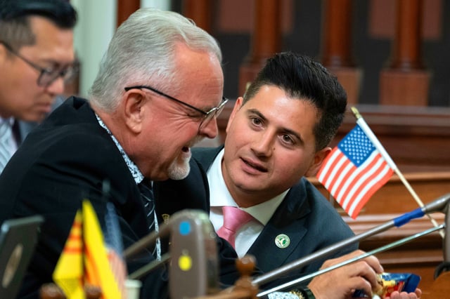 FILE: Republican Assemblymembers Tom Lackey, of Palmdale, left, and Bill Essayli, of Riverside, huddle at the Capitol in Sacramento, Calif., July 10, 2023. 