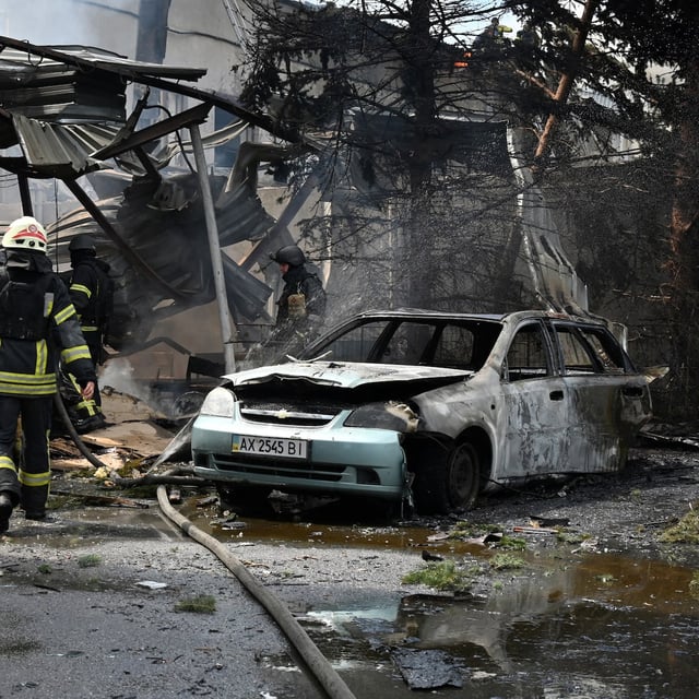 Ukrainian rescuers work at the site of an aerial attack in Kharkiv on July 24. This has been the deadliest summer so far in Russia's war on Ukraine, which began in February, 2022.