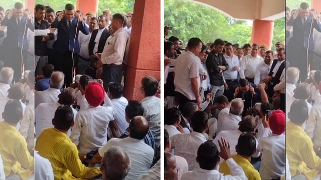 Shahjahanpur SDM doing sit-ups in front of protesting lawyers outside his office. Screenshot from a viral video.