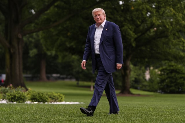 President Donald Trump walks from Marine One after arriving on the South Lawn of the White House, Tuesday, July 29, 2025, in Washington.