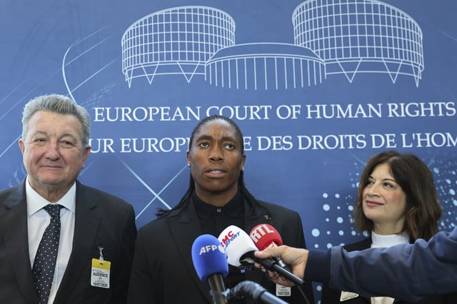 South Africa's Caster Semenya, center, answers reporters with lawyers Gregory Nott, left, and Shona Jolly KC after Semenya won a partial victory at the European Court of Human Rights on in her seven-year legal fight against track and field's sex eligibility rules, Thursday, July 10, 2025 in Strasbourg, eastern France. (AP Photo/Antonin Utz)