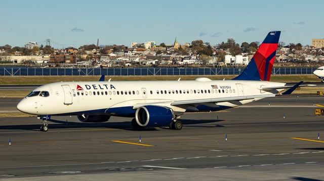 A woman was able to bypass multiple security checkpoints and board a Delta flight from New York City to Paris.