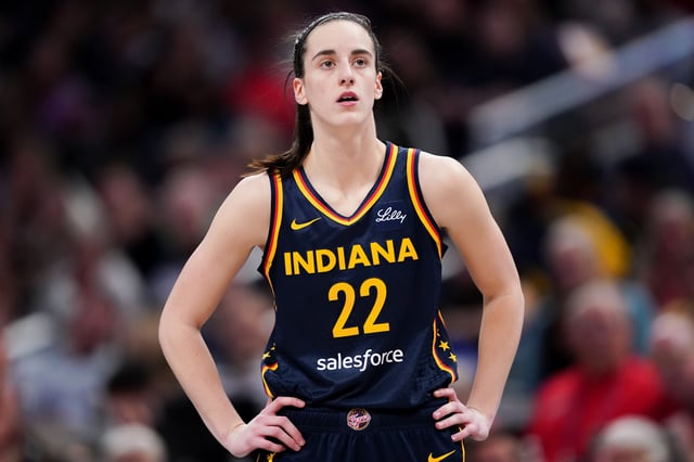Caitlin Clark #22 of the Indiana Fever walks across the court in the second quarter against the New York Liberty at Gainbridge Fieldhouse on May 16, 2024 in Indianapolis, Indiana.