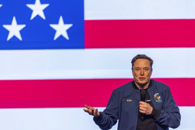 Elon Musk speaks at a town hall Sunday, March 30, 2025, in Green Bay, Wisconsin. THE CANADIAN PRESS/AP-Jeffrey Phelps