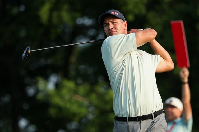 Jul 25, 2025; Blaine, Minnesota, USA; Adam Scott plays his shot from the 11th tee during the second round of the 3M Open golf tournament. Mandatory Credit: Matt Krohn-Imagn Images/File Photo
