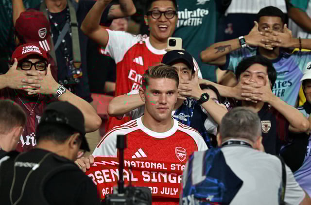 Soccer Football - Pre-Season Friendly - Arsenal v Newcastle United - National Stadium, Singapore - July 27, 2025
Arsenal's Viktor Gyokeres is pictured in the stands before the match REUTERS/Caroline Chia