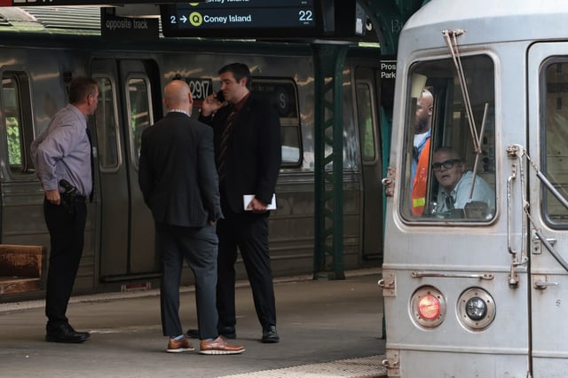 NEW YORK, NEW YORK - JULY 30: NYPD officers investigate the scene of a man hit by a train at the Prospect Park subway stop on July 30, 2025 in the Prospect Lefferts Gardens neighborhood of the Brooklyn borough in New York City. (Photo by Michael M. Santiago/Getty Images)