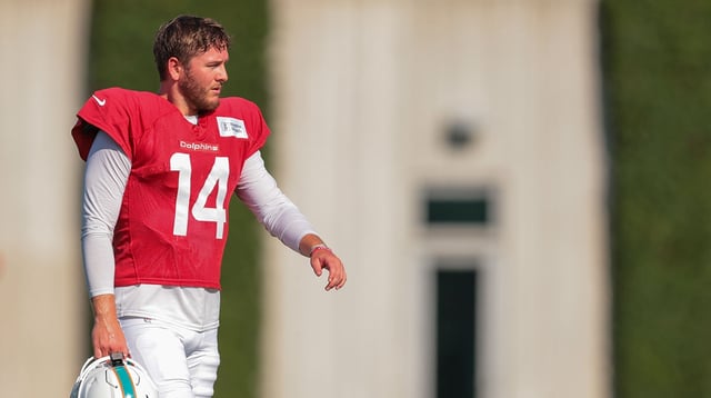 Jul 29, 2025; Miami Gardens, FL, USA; Miami Dolphins quarterback Quinn Ewers (14) looks on during training camp at Baptist Health Training Complex. Mandatory Credit: Sam Navarro-Imagn Images