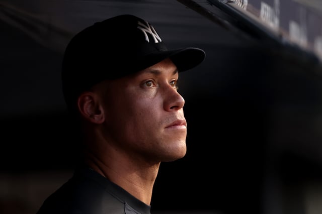 NEW YORK, NEW YORK - JULY 28: Injured Aaron Judge #99 of the New York Yankees stands in the dugout during their game against the Tampa Bay Rays at Yankee Stadium on July 28, 2025 in New York City.
