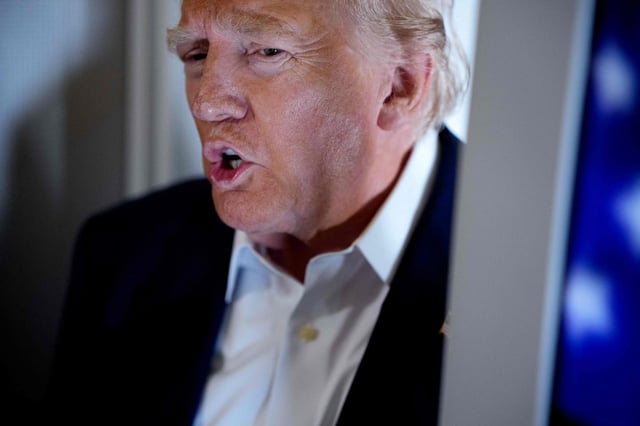 Donald Trump, mardi 29 juillet, à bord de l'Air Force One.