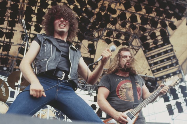Vocalist Paul Mario Day and guitarist Kenny Cox of heavy metal group More perform live on stage at the Monsters of Rock festival at Donington Park, Leicestershire, on Aug. 22, 1981.