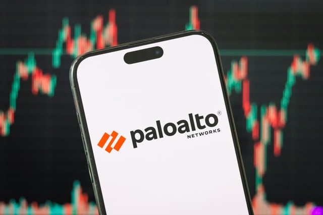CHONGQING, CHINA - MAY 18: In this photo illustration, the logo of Palo Alto Networks, Inc. is displayed on a smartphone screen, with the company's latest stock market chart in the background, reflecting investor sentiment and recent trading activity, on May 18, 2025, in Chongqing, China. Palo Alto Networks is a leading American multinational cybersecurity company that provides advanced firewalls, cloud-based security, and AI-driven threat intelligence solutions to businesses and governments worldwide. (Photo Illustration by Cheng Xin/Getty Images)