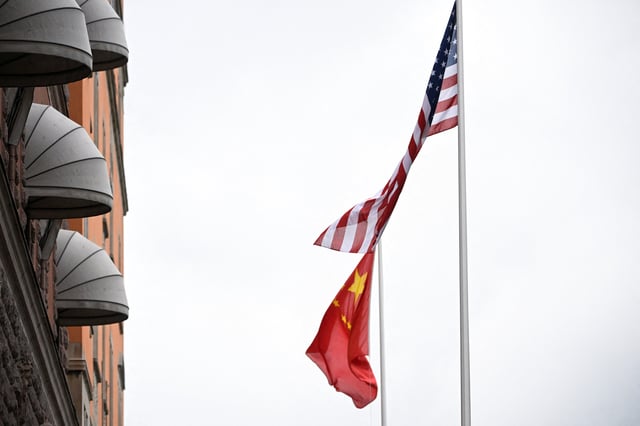 A U.S. and Chinese flag flutter outside Sweden's government offices "Rosenbad" in Stockholm, Sweden, July 29, 2025, ahead of the second day of trade talks between China and the U.S., TT News Agency/via REUTERS/File Photo