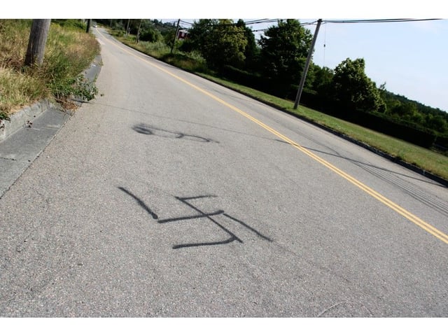  Along with the two swastikas was another drawning, pictured here in back. NICOLE SULLIVAN / CAPE BRETON POST