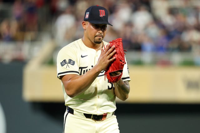 MINNEAPOLIS, MINNESOTA - JULY 25: Jhoan Duran #59 of the Minnesota Twins celebrates his teams win against the Washington Nationals after the game at Target Field on July 25, 2025 in Minneapolis, Minnesota.