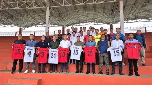 Kevipodi Sophie with DC Kohima B. Henok Buchem, SP Kohima Teisovise Metha, NFA president Neibou K. Sekhose, KDFA members and players.