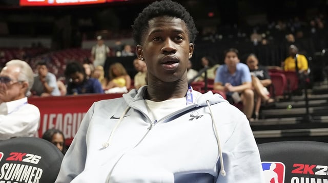 Jul 10, 2025; Las Vegas, NV, USA; Philadelphia 76ers guard VJ Edgecombe (77) watches the game against the San Antonio Spurs from the baseline at Thomas &amp; Mack Center. Mandatory Credit: Candice Ward-Imagn Images