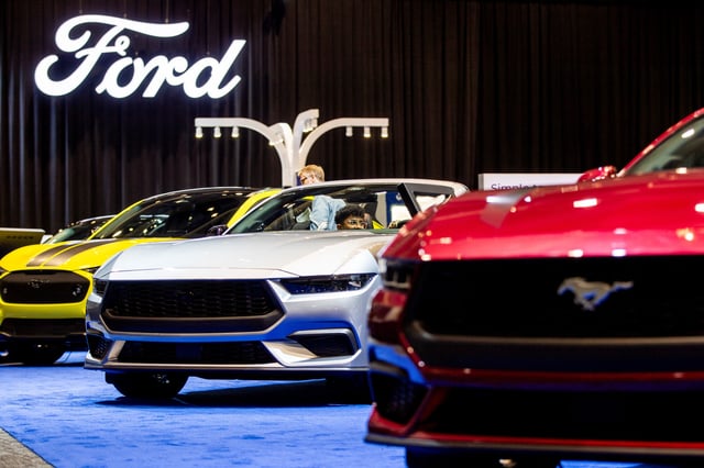 Ford Mustangs are seen on display at the Canadian International AutoShow in Toronto, Ontario, Canada February 13, 2025.  REUTERS/Carlos Osorio/File Photo