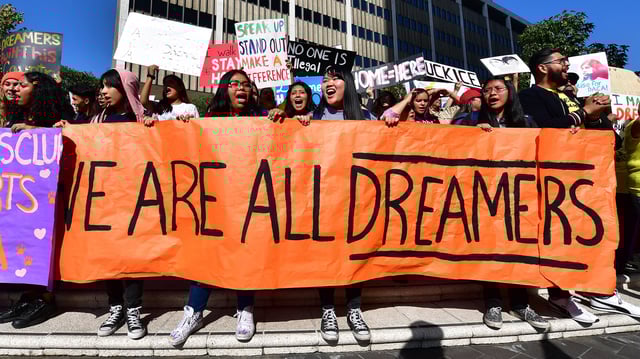 Students and supporters of DACA rally in downtown Los Angeles, California on November 12, 2019. (Photo by FREDERIC J. BROWN/AFP via Getty Images)