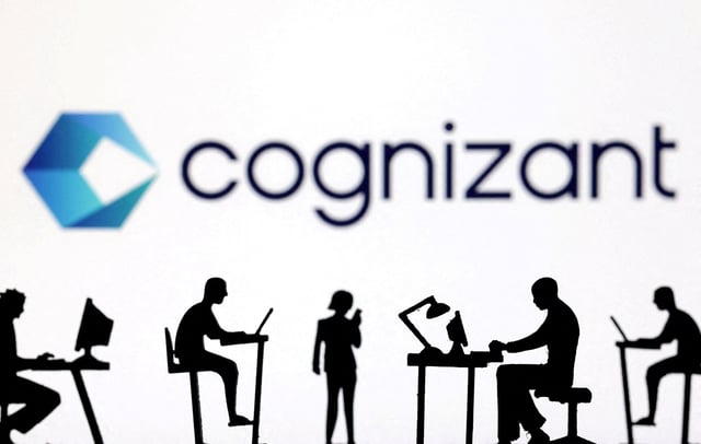 Figurines with computers and smartphones are seen in front of Cognizant logo in this illustration taken, February 19, 2024. REUTERS/Dado Ruvic/Illustration/File Photo
