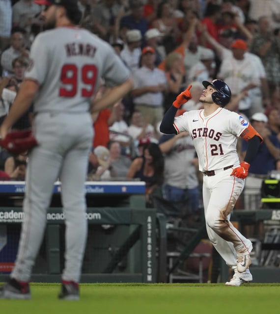 Houston Astros Yainer Diaz (21) reacts after hitting a 3-run home run off Washington Nationals pitcher Cole Henry during the seventh inning of an MLB baseball game in Houston, Wednesday, July 30, 2025.