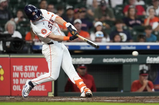 Houston Astros Zack Short (38) hits a single during the second inning of an MLB baseball game in Houston, Wednesday, July 30, 2025.