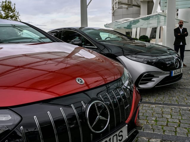 Mercedes-Benz' electric cars are displayed outside the company's offices in Lisbon.