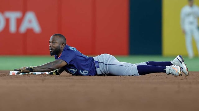 Jul 28, 2025; West Sacramento, California, USA; Seattle Mariners left fielder Randy Arozarena (56) steals second base during the fifth inning against the Athletics at Sutter Health Park. Mandatory Credit: Sergio Estrada-Imagn Images