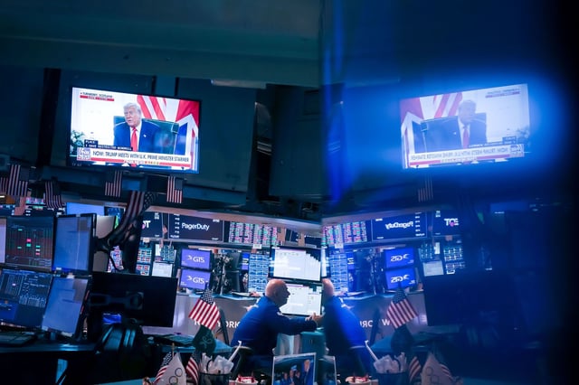 A television broadcast shows President Donald Trump on the floor of the New York Stock Exchange on Monday, July 28, 2025.