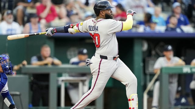 Jul 29, 2025; Kansas City, Missouri, USA; Atlanta Braves designated hitter Marcell Ozuna (20) hits a home run during the sixth inning against the Kansas City Royals at Kauffman Stadium. Mandatory Credit: Jay Biggerstaff-Imagn Images