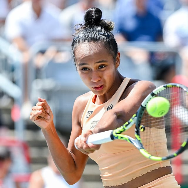 Leylah Fernandez, of Canada, plays a shot to Maya Joint, of Australia, during their first round match at the National Bank Open tennis tournament in Montreal, Tuesday, July 29, 2025. THE CANADIAN PRESS/Graham Hughes