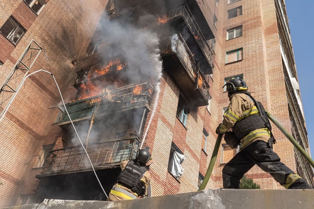 KOSTIANTYNIVKA, UKRAINE - JULY 30: Ukrainian emergency service workers extinguish a fire that broke out after a Russian FPV drone hit a house in Kostiantynivka, Ukraine, 30 July 2025. (Photo by Diego Herrera Carcedo/Anadolu via Getty Images)