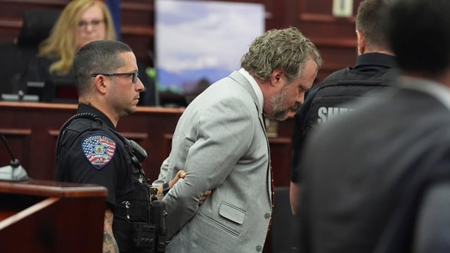 Dentist James Craig, front right, is led away as Judge Shay Whitaker, back, looks on after verdict rendered in his murder trial in district court in Araphaoe Couty Wednesday, July 30, 2025, in Centennial, Colo. 