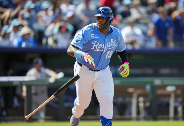 Jul 30, 2025; Kansas City, Missouri, USA; Kansas City Royals designated hitter Salvador Perez (13) tosses his bat after hitting a walk-off during the tenth inning against the Atlanta Braves at Kauffman Stadium. Mandatory Credit: Jay Biggerstaff-Imagn Images