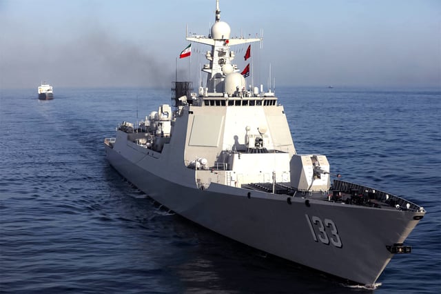 This handout photo made available by the Iranian Army Office on March 11, 2025, shows the Chinese People&#39;s Liberation Army Navy guided-missile destroyer Baotou during joint military drills between Iran, Russia, and China in the Gulf of Oman.