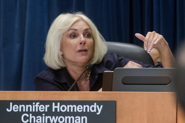 National Transportation Safety Board Chairwoman Jennifer Homendy presides over the NTSB fact-finding hearing on the DCA midair collision accident, at the National Transportation and Safety Board boardroom, Wednesday, July 30, 2025, in Washington. (AP Photo/Rod Lamkey, Jr.)