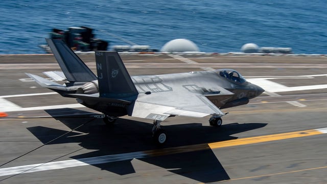 PACIFIC OCEAN (May 5, 2023) – An F-35C Lightning II, assigned to the “Rough Raiders” of Strike Fighter Squadron (VFA) 125, lands on the flight deck of the Nimitz-class aircraft carrier USS Theodore Roosevelt (CVN 71), May 5, 2023. Theodore Roosevelt is conducting carrier qualifications with the “Flying Eagles” of Strike Fighter Squadron (VFA) 122, the “Rough Raiders” of VFA-125, the “Vikings” of Electronic Attack Squadron 129, the “Titans” of Fleet Logistics Multi-Mission Squadron 30 and the “Eightballers” of Helicopter Sea Combat Squadron 8 ahead of an upcoming deployment workup cycle. (U.S. Navy photo by Mass Communication Specialist 3rd Class Carter Radke)