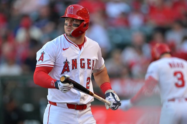 Angels star Mike Trout walks back to the dugout after striking out during the first inning of their loss to the Texas Rangers on Wednesday night at Angel Stadium. (Photo by Jayne Kamin-Oncea/Getty Images)