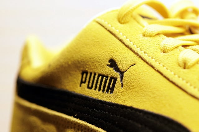 A Puma logo is seen on a Puma Speedcat OG sneaker displayed at the Puma Mostro House in Paris, France, January 24, 2025. REUTERS/Abdul Saboor/File Photo