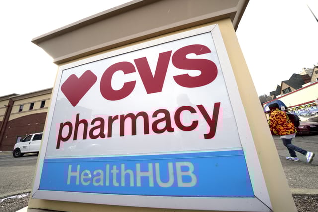 FILE - A CVS store sign is displayed in Pittsburgh on Friday, Feb. 3, 2023. (AP Photo/Gene J. Puskar, File)
