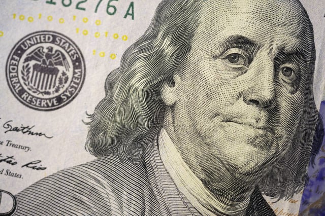 FILE - The likeness of Benjamin Franklin is seen on a U.S. $100 bill, Feb. 22, 2023, in Marple Township, Pa. (AP Photo/Matt Slocum, File)